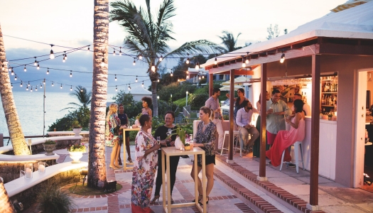 A group of people at an outdoor bar in Bermuda