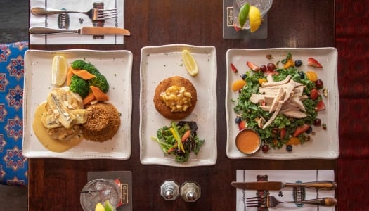 A wide shot of a plate of food at flanagns